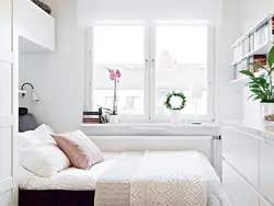 Design options for a small bedroom with a window