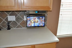 Фото телевизор на кухне на столе