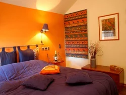 Orange color in the bedroom interior