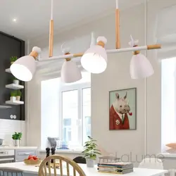 Подвесные потолочные светильники в интерьере кухни