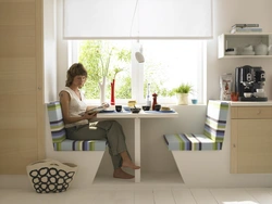 Table in the kitchen by the window interior design