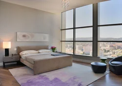 Дизайн спальни с панорамными окнами в квартире