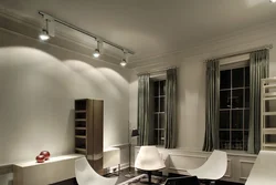 Track lighting system in the bedroom interior