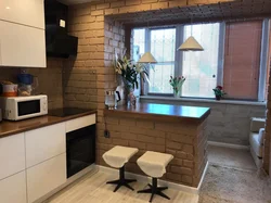 Kitchen with balcony and breakfast bar design