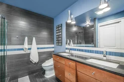 What color goes with gray in a bathroom interior