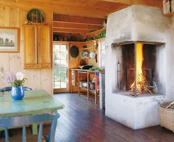 Интерьер деревенского дома кухни с печкой
