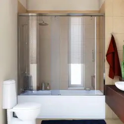 Стеклянная шторка для ванной в интерьере