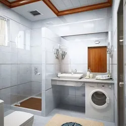 Combined bathrooms with shower and washing machine photo