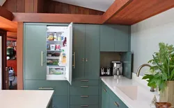 Built-in refrigerator in a small kitchen photo