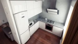 Kitchen in a five-story building with a refrigerator photo