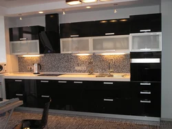 Photo of kitchen with black glass