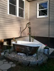 Чугунная ванна на даче фото