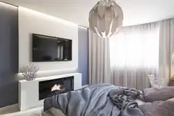 Спальня с камином и телевизором фото