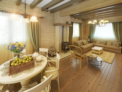 Кухня и гостиная на даче в деревянном доме фото