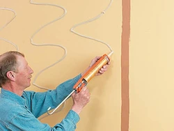 How to glue a panel to a wall in the kitchen photo