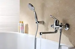 Faucet with shower for bathroom interior photo