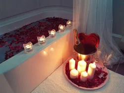 Romantic in the bathroom by candlelight photo