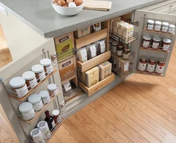 Organizing storage in the kitchen in cabinets photo