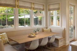 Kitchen design with sofa and table by the window