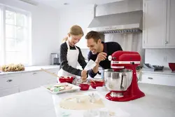 Kitchen interior with people