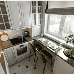 Интерьер кухни с окном и подоконником