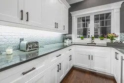 White kitchen apron and countertop design