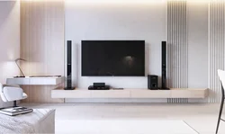 Белый телевизор в интерьере гостиной
