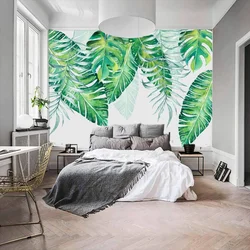 Photo wallpaper palm leaves in the bedroom interior