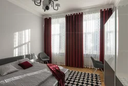 Бордовые шторы в интерьере спальни