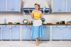 Photo Of A Housewife In The Kitchen