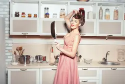 Photo of a housewife in the kitchen