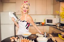 Photo of a housewife in the kitchen