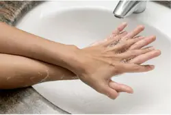 Photo of hand in bath