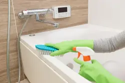 Cleaning the bathroom photo