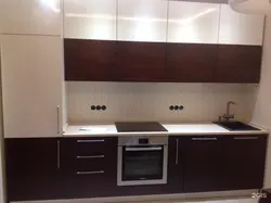 Straight brown kitchen photo