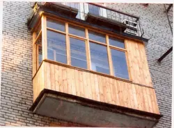 Wooden windows on the loggia photo