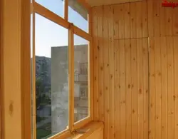 Wooden windows on the loggia photo