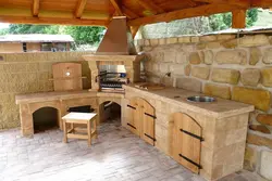 Summer kitchen with stove photo
