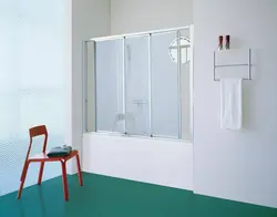 Bathtub With Plastic Curtains Photo