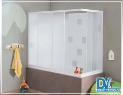 Bathtub with plastic curtains photo