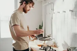 Man cooking in the kitchen photo