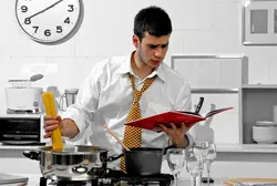 Man Cooking In The Kitchen Photo