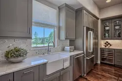 Photo of a kitchen with a window on the right