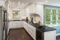 Photo of a kitchen with a window on the right