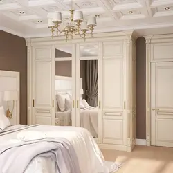 Neoclassical wardrobe in the bedroom photo