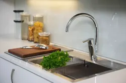 Two faucets in the kitchen photo