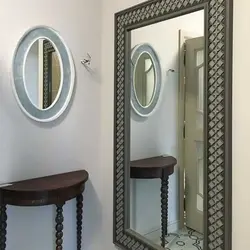 Hallway with oval mirror photo