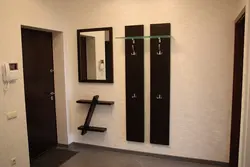 Hangers for a narrow hallway photo