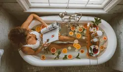 Фото в ванне с апельсинами