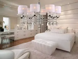 White chandeliers in the living room photo